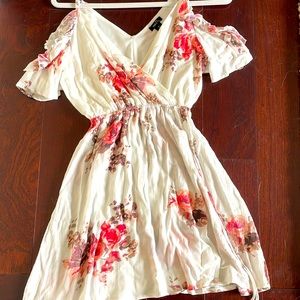 White Rue 21 dress with pink flowers, never worn. Runs slightly large.